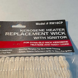 May include: A kerosene heater replacement wick with ignitor, model # RW16CP, packaged in a clear plastic bag with a black and red header card. The text reads Kerosene Heater Replacement Wick With Ignitor for Dyna-Glo wick kerosene heaters.