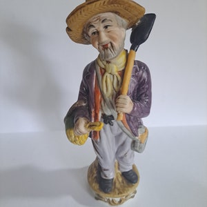 Old man figurine