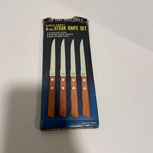 Vintage steak knife set in original box. 2 sets of 4