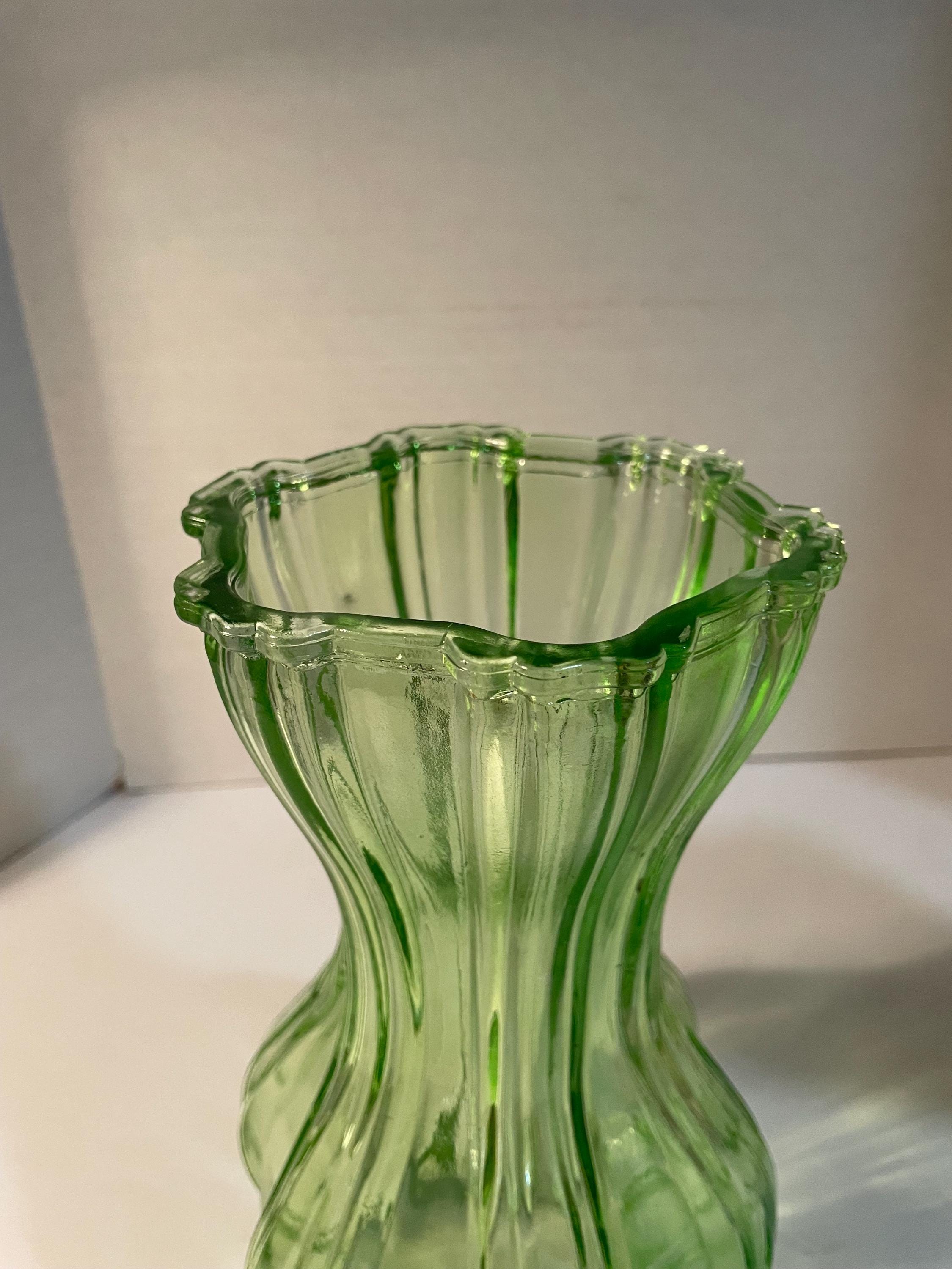 Vintage Indiana green glass vase with acorn design on bottom