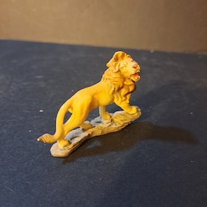 Lion figure on rock