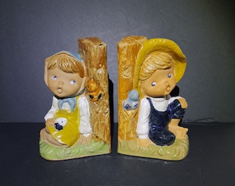 Vintage boy and girl bookends