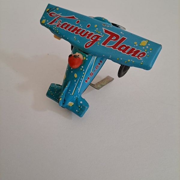 Wind up tin plane