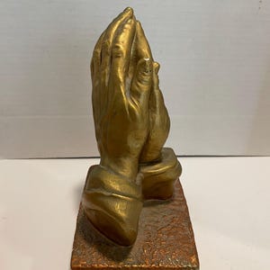 Plaster Chalkware praying hands.