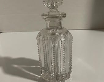 Vintage cut glass perfume bottle with matching stopper