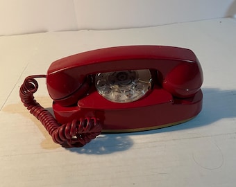 Red vintage rotary princess style phone
