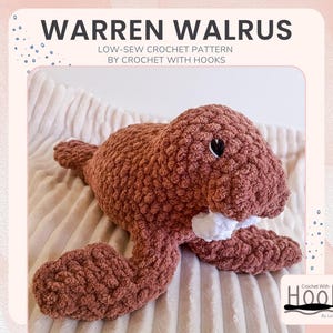 May include: A handmade, brown crochet walrus plush toy with white tusks and black eyes. The text "WARREN WALRUS" and "LOW-SEW CROCHET PATTERN BY CROCHET WITH HOOKS" are displayed on the image. The plush is lying on a soft, cream-colored blanket.