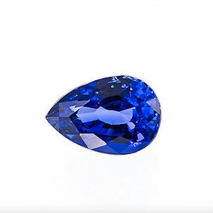 May include: A pear-shaped sapphire gemstone with a deep blue color.