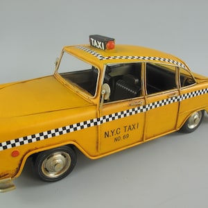 Vintage Metal NYC Taxi Model: Collectible Car Decor
