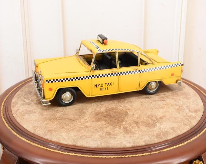 Vintage Yellow Taxi Model Car: New York Collector Decor