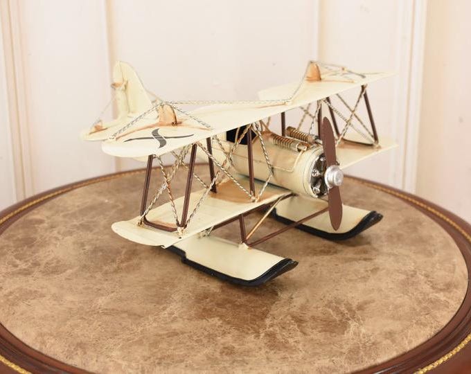 Vintage White Metal Airplane Model: Water Worn Aviation Decor