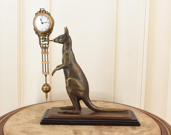 Bronze Kangaroo Clock with Rocking Pendulum on Wooden Base