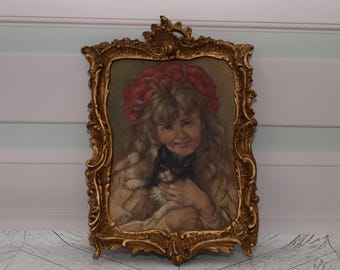 Cuadro antiguo Art Déco: Niña con gato, marco dorado, firmado.