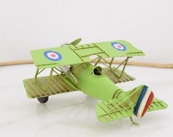 Vintage Green Metal Airplane Model: Classic Biplane Decor