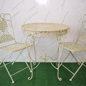 White Metal Garden Furniture Set: Elegant Patio Table & Chairs