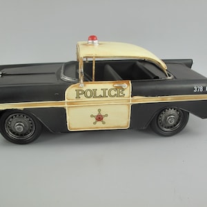 Vintage Metal Police Car Model: Old School Auto Decor