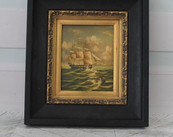 Pintura de barco vintage: arte marino hecho a mano con marco dorado y negro