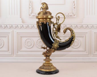 Vintage Porcelain Cornucopia: Black Horn of Plenty with Bronze Ornaments