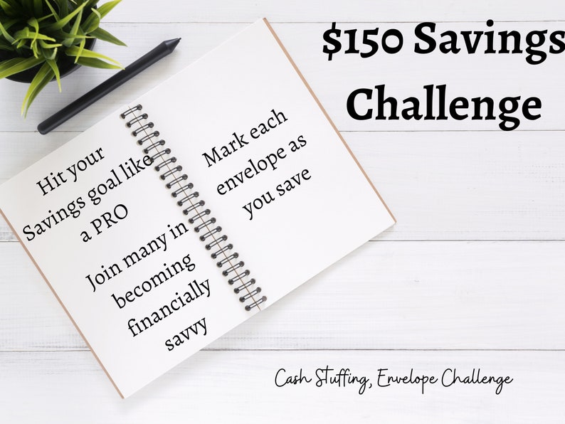 May include: A white notebook with a black spiral binding. The notebook is open and has text written on both pages. The text on the left page reads "Hit your Savings goal like a PRO Join many in becoming financially savvy". The text on the right page reads "Mark each envelope as you save". The notebook is on a white wooden surface. The text "$150 Savings Challenge" is written in black at the top of the image. The text "Cash Stuffing, Envelope Challenge" is written in black at the bottom of the image.