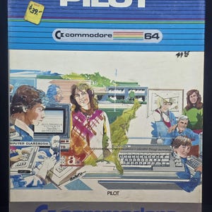 May include: A vintage Commodore 64 software box for PILOT. The box features a colorful illustration of people using computers in a classroom setting. The text "PILOT" and "Commodore 64" are prominently displayed. A price tag shows $39.