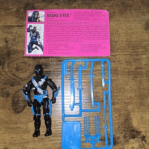 Figura clásica de GI Joe Ninja Force Snake-Eyes, especialista en misiones encubiertas, de 1992, con tarjeta de archivo
