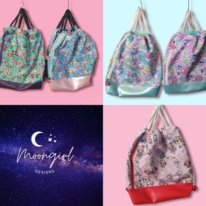 May include: Four drawstring bags with different colorful cartoon designs. The bags are made of fabric and have a drawstring closure. The bags are hanging from a white background.