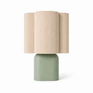 May include: A table lamp featuring a cylindrical, ribbed lampshade in a light beige color, paired with a solid, rounded rectangular base in a muted sage green finish. The lamp has a clean, vertical structure with a textured surface.