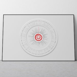 May include: A white circular calendar with a red centre and black text. The calendar is designed in a radial pattern with the days of the week and months listed around the edge.