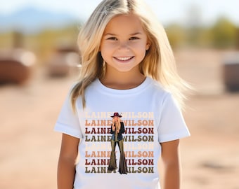 Laineysponsor Jugend-T-Stück, Mädchen Lainey T-Shirt, Komfortfarben, kleiner Lainey Fan, Western, Countrymusik, LW, Herz wie ein LKW