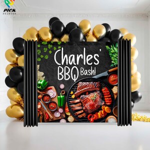 May include: A party backdrop featuring the text "Charles' BBQ Bash!" with a barbecue grill graphic. The backdrop is framed by black and gold balloons. The image includes grilled meats, vegetables, and sauces.