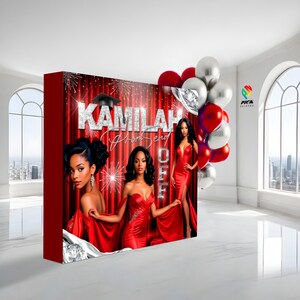 May include: A red and silver backdrop with the text "Kamilah Prom Send Off" and three women in red dresses. The backdrop is decorated with silver glitter and fireworks.