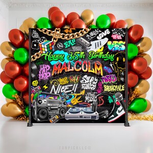 May include: A black and white graffiti backdrop with colorful spray paint designs, including the words "Happy 35th Birthday Malcolm", "Hip Hop", "Stay Funky", "Nice!!", and "Street Music". The backdrop also features a boombox, a DJ mixer, a microphone, and a pair of sneakers.