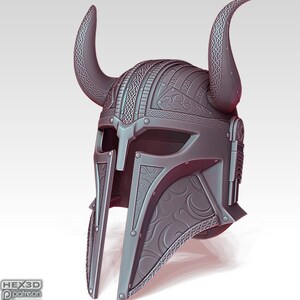 May include: A gray, intricately designed helmet with large, curved horns. The helmet features detailed patterns, rivets, and a visor. The overall design suggests a fantasy or historical theme. The text "HEX3D patreon" is visible in the lower left corner.