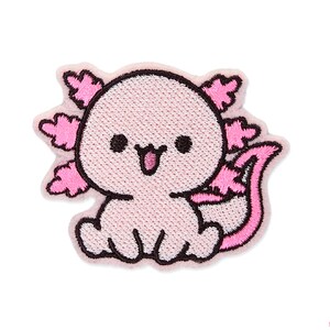 May include: Pink and black embroidered iron-on patch of an axolotl with a happy expression. The axolotl has a pink body and black eyes, mouth, and gills. The axolotl is sitting on its tail.