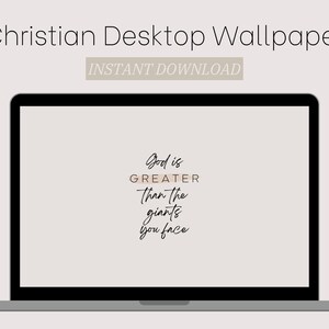May include: A laptop computer screen displaying a motivational quote in a minimalist style. The quote reads "God is GREATER than the giants you face".
