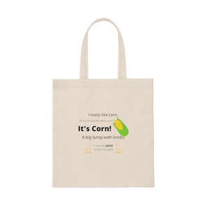 Può includere: Una borsa di tela beige con una grafica divertente di una pannocchia di mais e il testo "Mi piace molto il mais. Cosa ti piace del mais? È mais! Un grosso grumo con pomelli. Ha il SUCCHIO (Ha il succo)"