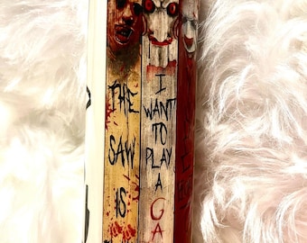 Los favoritos de Halloween de las películas de terror en un vaso que brilla en la oscuridad