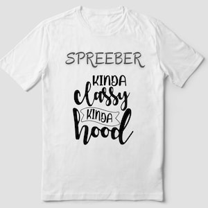 May include: White t-shirt with black text that reads "Spreeber Kinda Classy Kinda Hood".