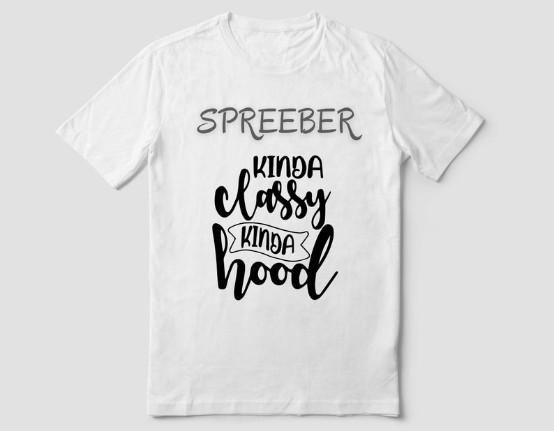 May include: White t-shirt with black text that reads "Spreeber Kinda Classy Kinda Hood".