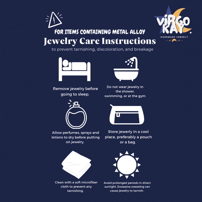 May include: Jewellery care instructions on a navy blue background. The text reads "For items containing metal alloy" and "Jewellery Care Instructions". Icons illustrate removing jewellery before bed, avoiding water, letting lotions dry, storing in a cool place, cleaning with a cloth, and avoiding sunlight.