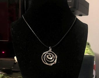 handmade whimsigoth indie black cord necklace with silver spiral swirl pendant
