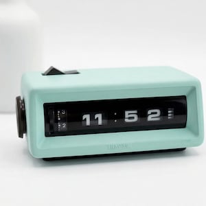 Reloj de sobremesa antiguo con mecanismo giratorio / Lumitime ST-30 / Azul espuma de mar / 1974, Japón