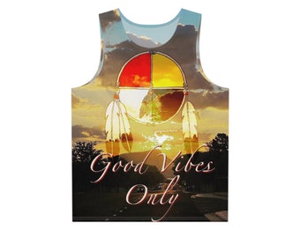 May include: A sleeveless tank top with a colorful Native American dreamcatcher design and the text "Good Vibes Only" printed on the front. The background is a sunset with clouds and a road.