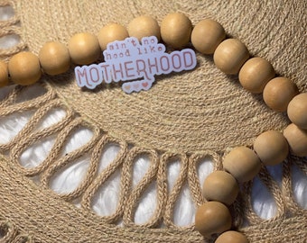 Clear iridescent Ain’t no hood like a motherhood sticker 2.75x1.25