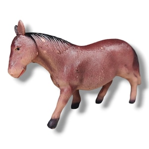 May include: A brown plastic toy horse figurine with black hooves and a black mane. The horse is standing on all four legs and has its head turned to the side.