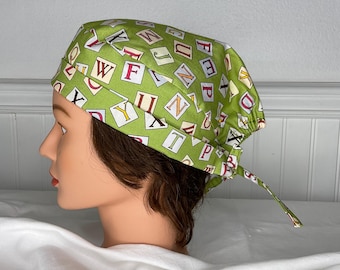 ABC’s on Green Background | Scrub Cap | Surgical Hat | Unisex | Doctor and Nurse Gifts