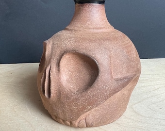 Botella/jarrón con forma de calavera