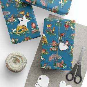 Cute wrapping paper with vintage illustrations depicting different nursery rhymes. The paper is primarily blue.