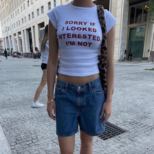 Sorry If I Looked Interested Y2K Slogan Baby Tee, Funny Graphic Organic Cotton T-Shirt