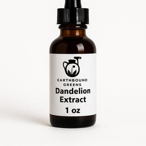 May include: A brown glass bottle of Earthbound Greens Dandelion Extract with a black dropper. The white label features a black illustration and the text "Dandelion Extract" and "1 oz".